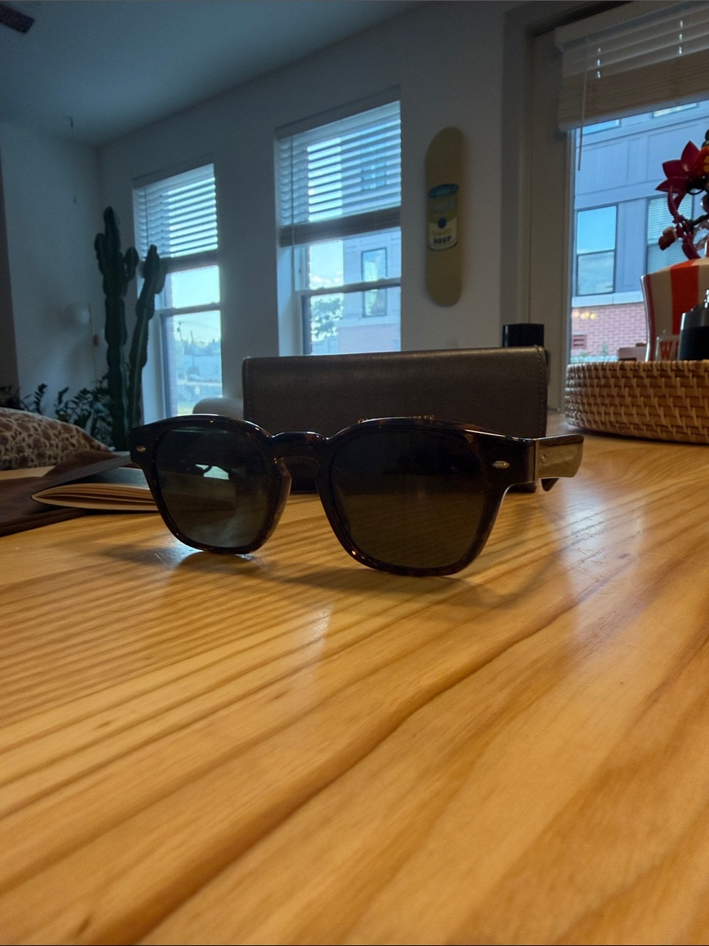 Oliver Peoples Tortoise Shell Sunglasses with Dark Lenses